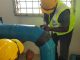 Waterproof pipe repair tape being applied to seal a leaking pipe