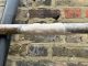 Epoxy putty used to repair a leaking water supply pipe
